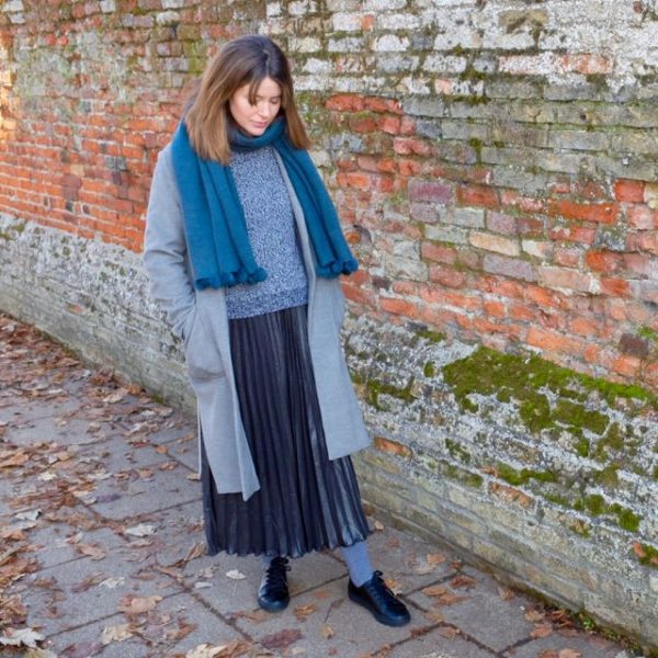 Pleated skirt and woolly jumper